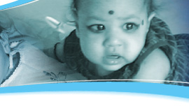 Shreshta at 5th month when she is trying to crawl but not yet fully there